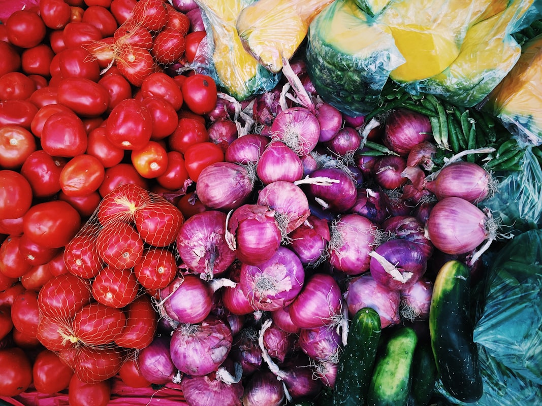 Hands preparing fresh produce during cooking class